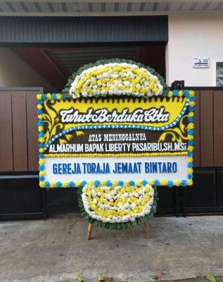 Papan Bunga Duka di Bumi Sari